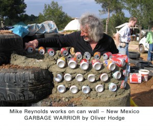 Mike Reynolds works on can wall - New Mexico